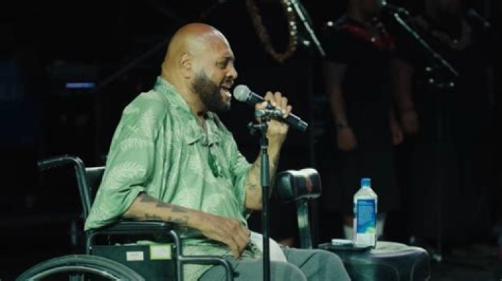 Why Is Singer Fiji In A Wheelchair? George Veikoso Illness & Health Condition